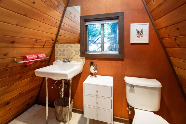 a view of balcony with deck and wooden floor