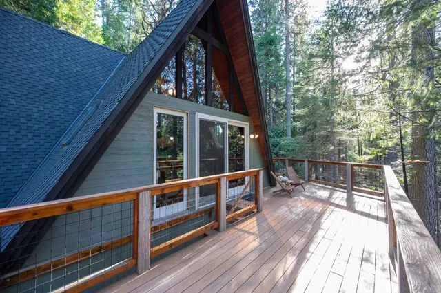 a backyard of a house with lots of green space