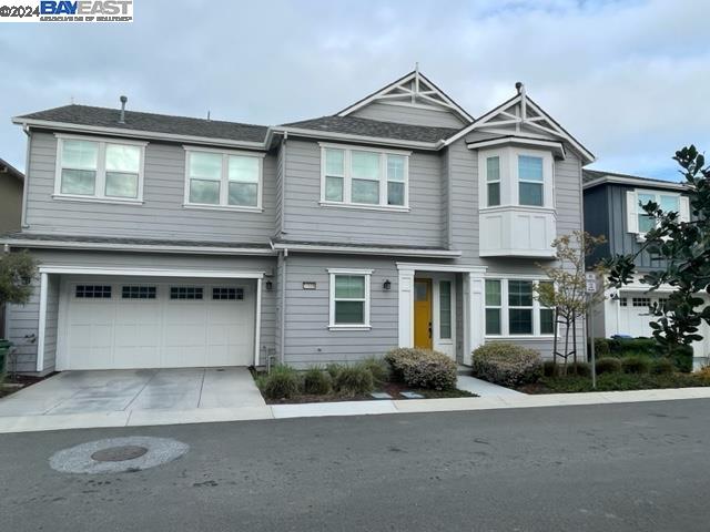 a front view of a house with yard