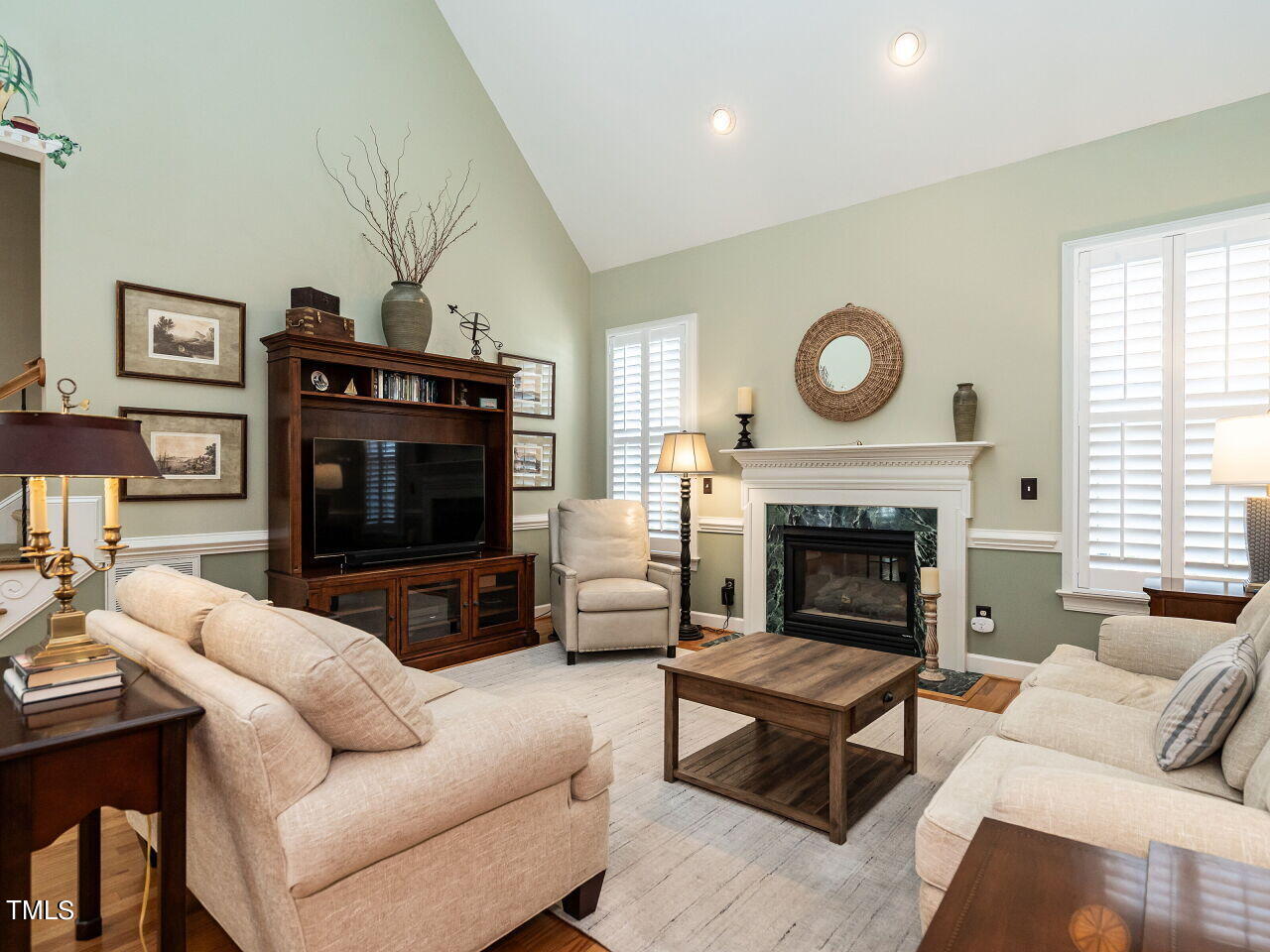 113 Kingsport Road Holly Springs, NC 27540 - Photo 10 of 31 Light filled living room with gas fireplace.