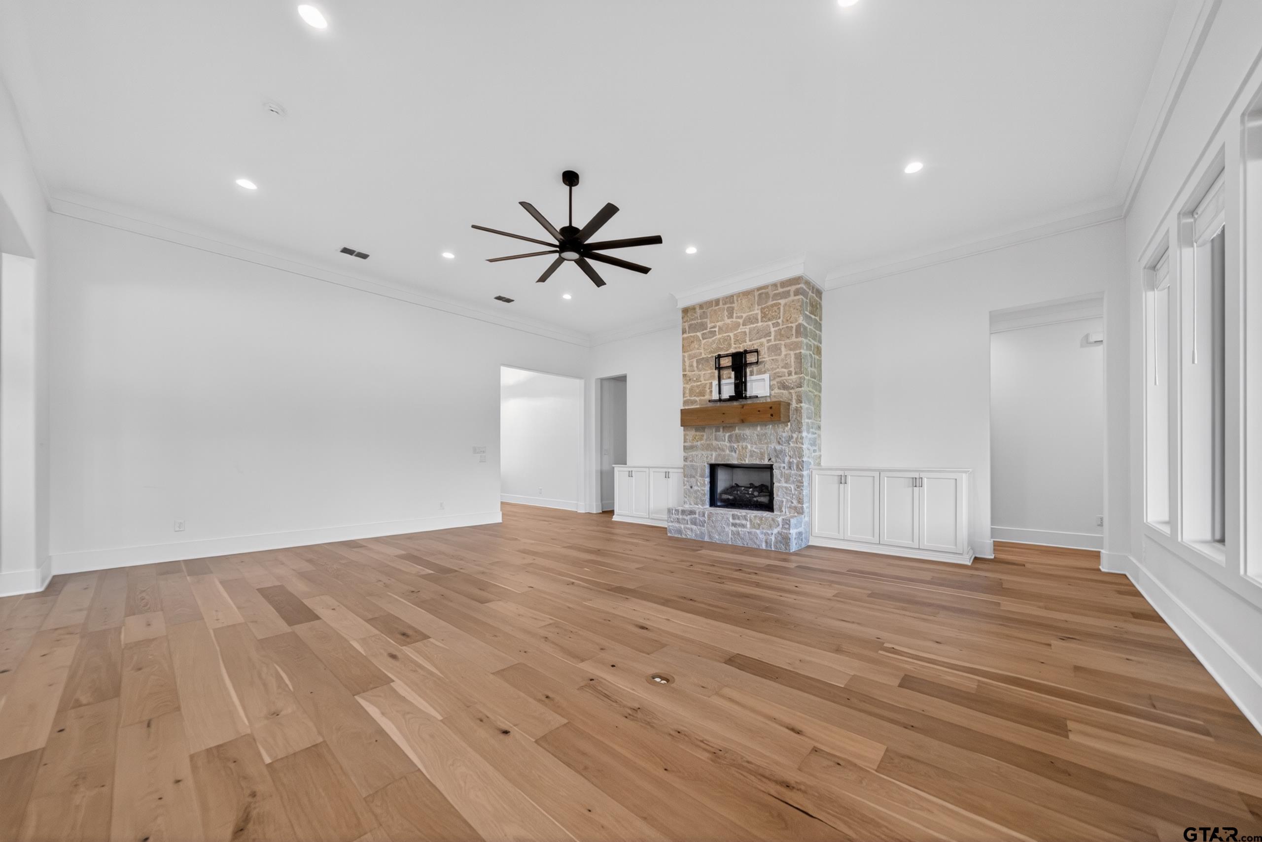 7517 Cross Gate Way Tyler, TX 75703 - Photo 35 of 47 a view of empty room with wooden floor and window