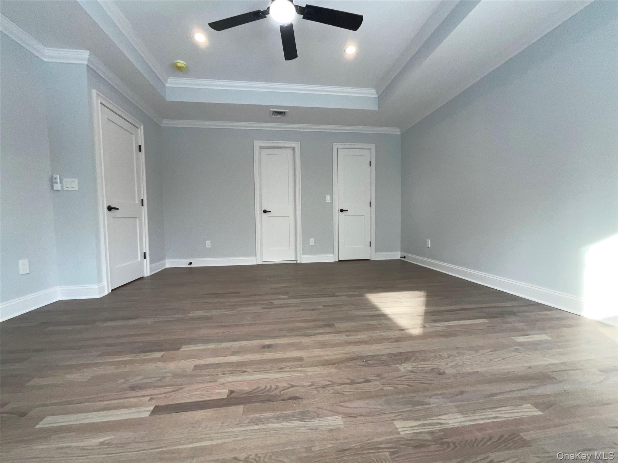 89 B Mount Sinai-Coram Road Coram, NY 11727 - Photo 16 of 23 a view of empty room with wooden floor