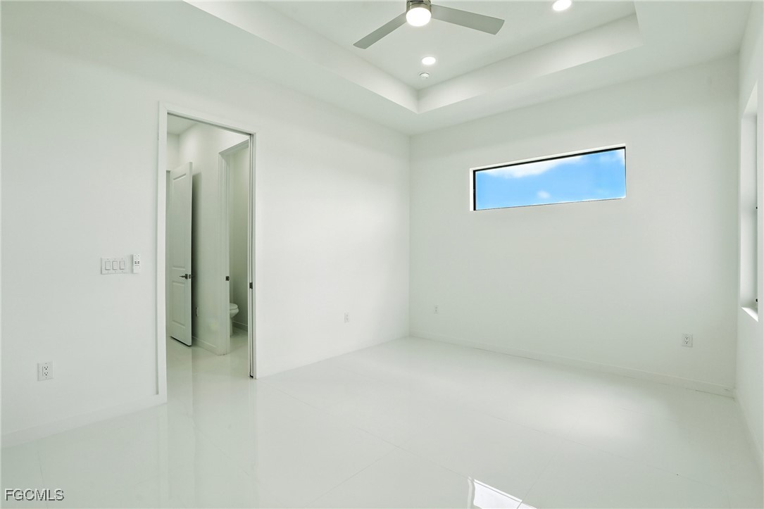2725 Embers Parkway West Cape Coral, FL 33993 - Photo 15 of 32 an empty room with a bathroom
