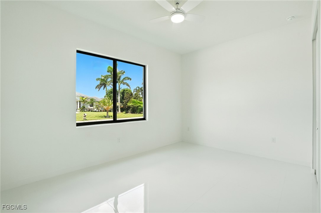 2725 Embers Parkway West Cape Coral, FL 33993 - Photo 19 of 32 a view of a hallway with a window