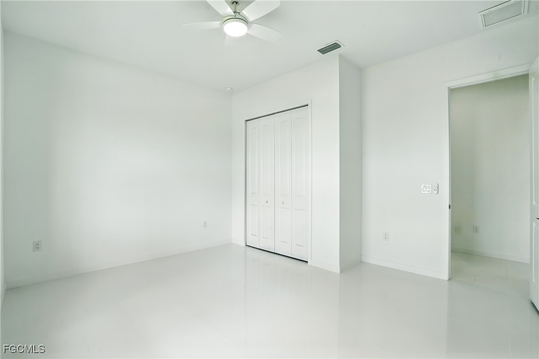 2725 Embers Parkway West Cape Coral, FL 33993 - Photo 20 of 32 an empty room with a fan
