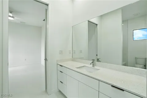 a bathroom with a bathtub and a toilet