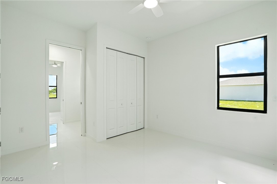 2725 Embers Parkway West Cape Coral, FL 33993 - Photo 28 of 32 a view of an empty room with a window
