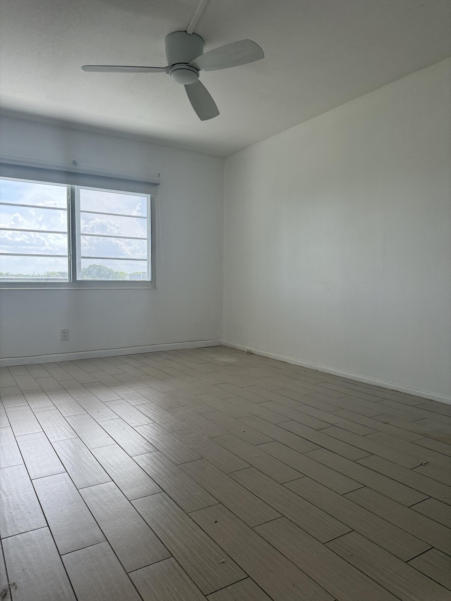 4085 Cornwall East Boca Raton, FL 33434 - Photo 11 of 15 an empty room with windows
