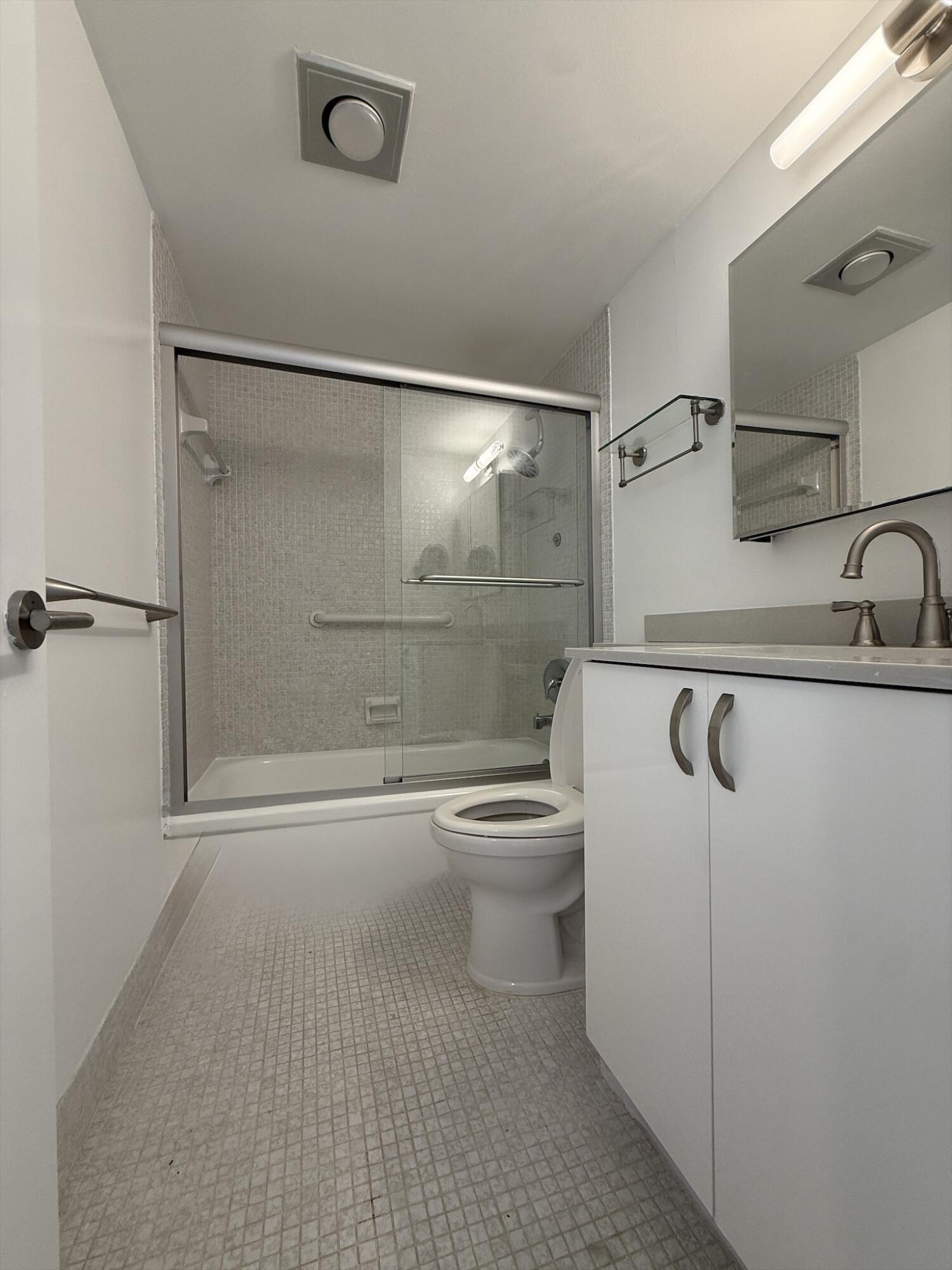 4085 Cornwall East Boca Raton, FL 33434 - Photo 8 of 15 a bathroom with a shower a toilet and sink