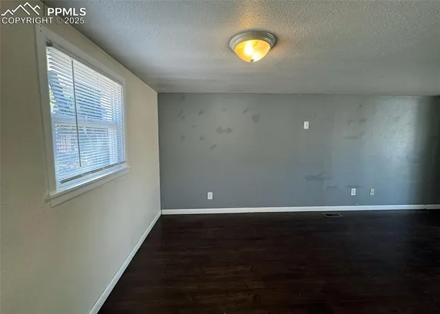 a view of room with window and natural light