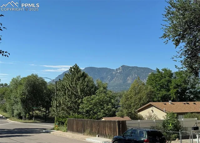 a view of house with mountain view