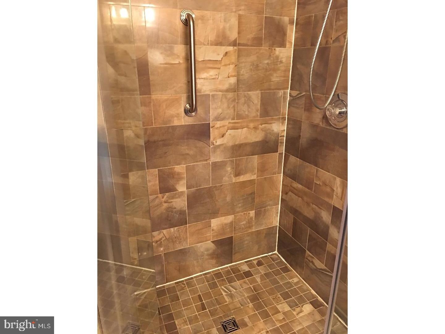 19 Hanover Court Princeton, NJ 08540 - Photo 16 of 25 a bathroom with a shower