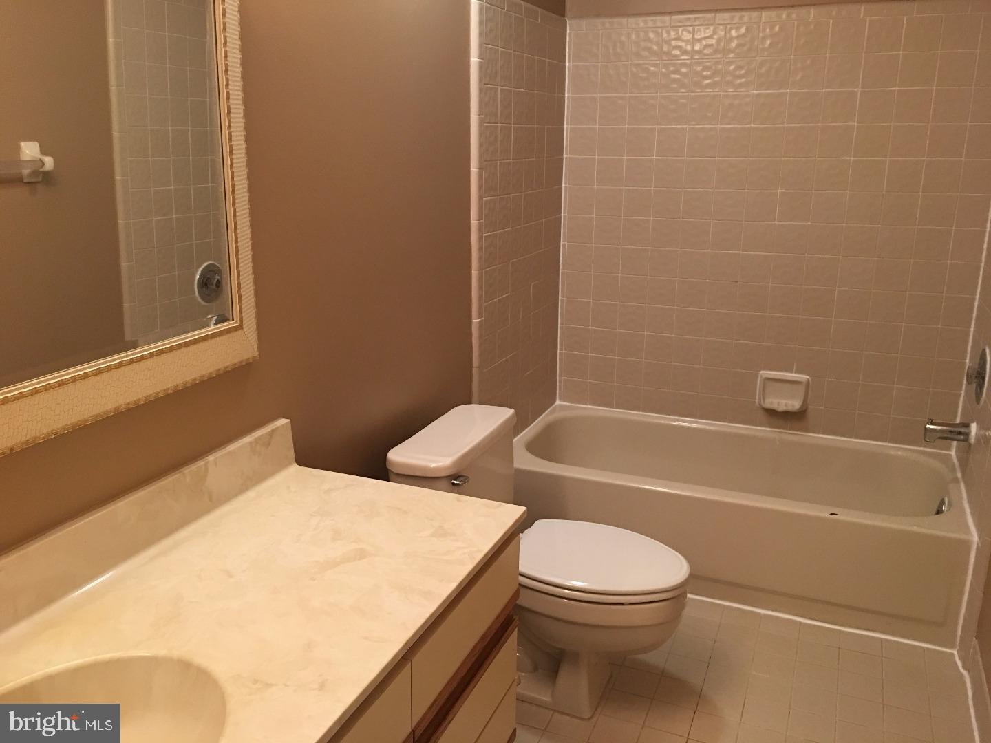 19 Hanover Court Princeton, NJ 08540 - Photo 19 of 25 a bathroom with a toilet a sink and bathtub