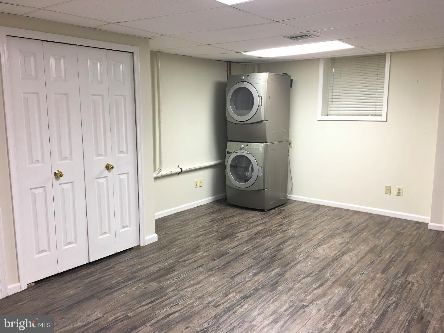 19 Hanover Court Princeton, NJ 08540 - Photo 20 of 25 a view of a storage & utility room with wooden floor