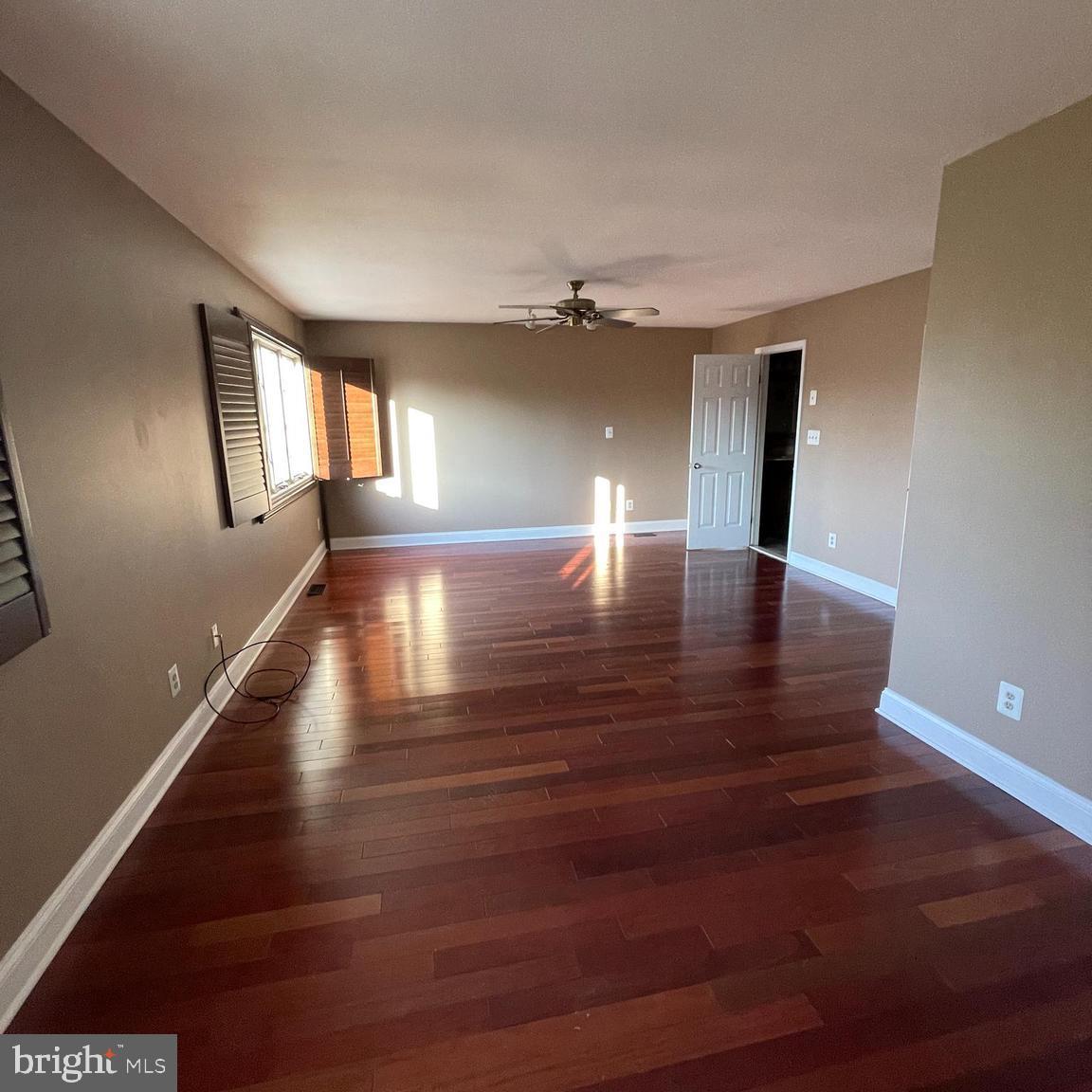 19 Hanover Court Princeton, NJ 08540 - Photo 10 of 25 a view of empty room with window and wooden floor