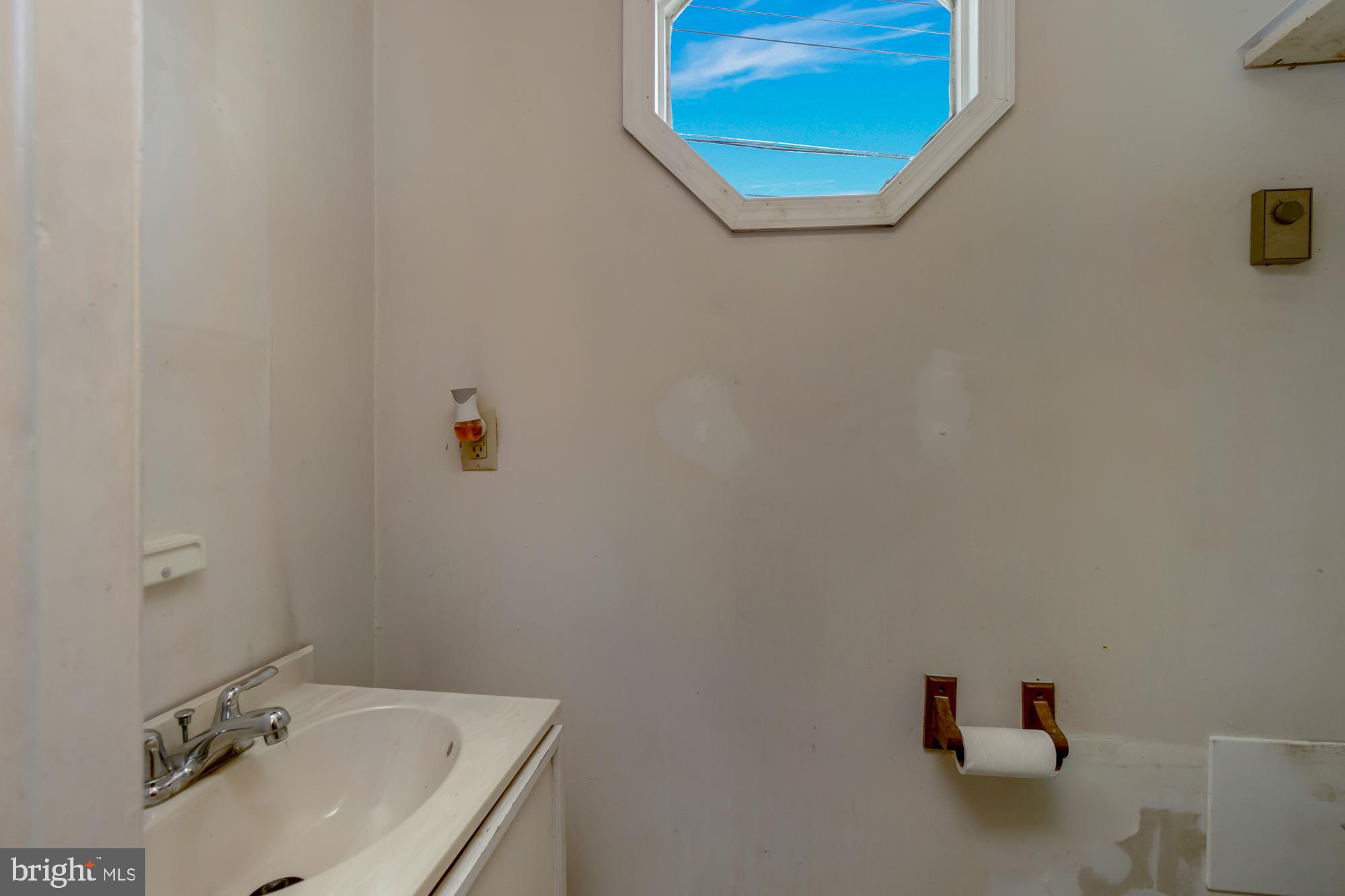 2700 Burridge Road Baltimore, MD 21234 - Photo 30 of 39 1?2 bath off laundry room