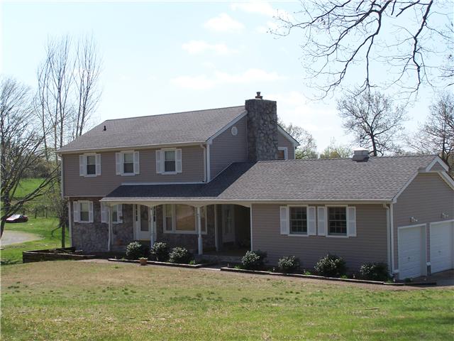 511 Lee Road Cottontown, TN 37048 - Photo 1 of 1 a front view of a house with a yard