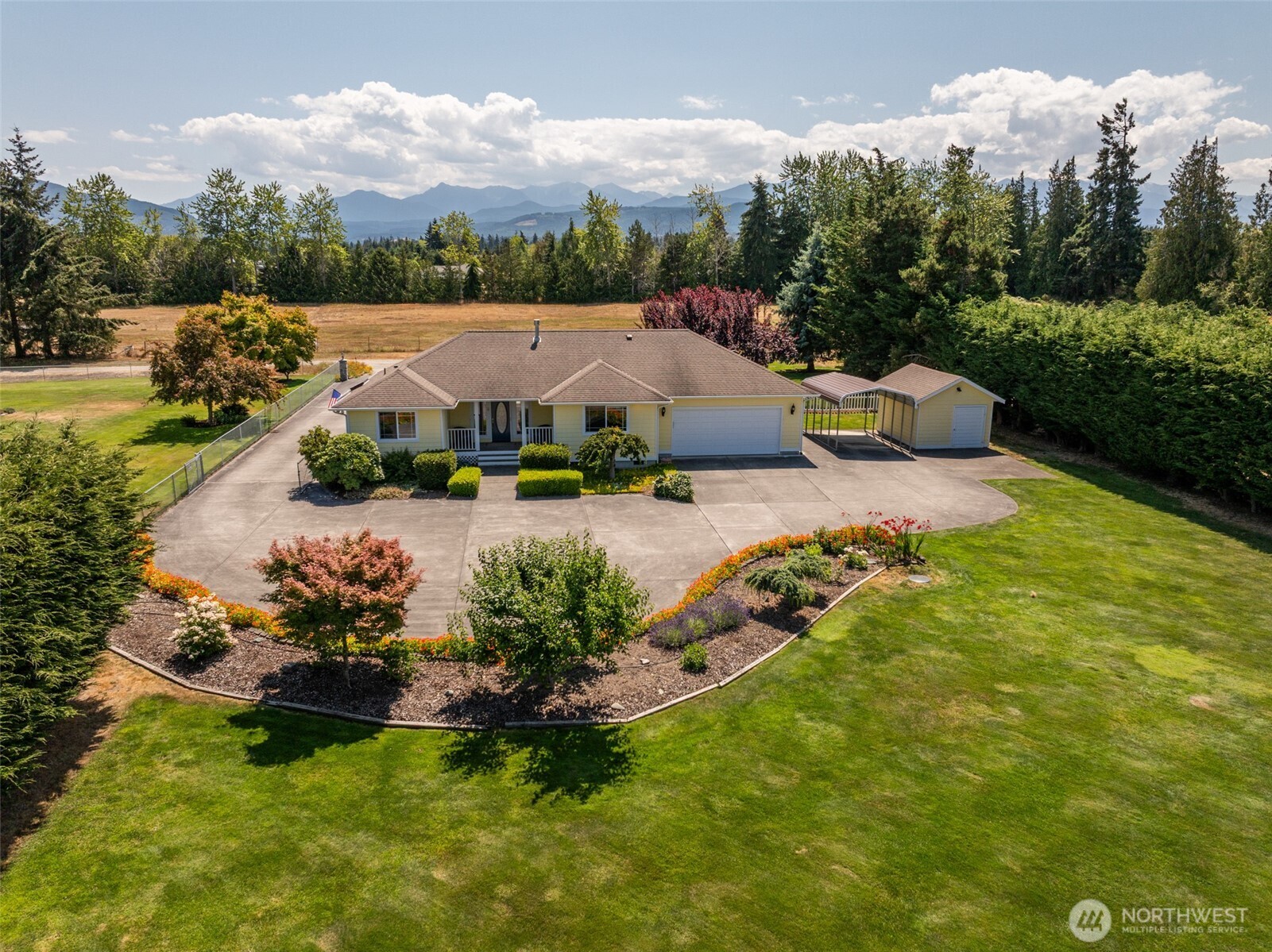 170 Donaper Road Sequim, WA 98382 - Photo 2 of 40 an aerial view of a house with garden space lake view and mountain view