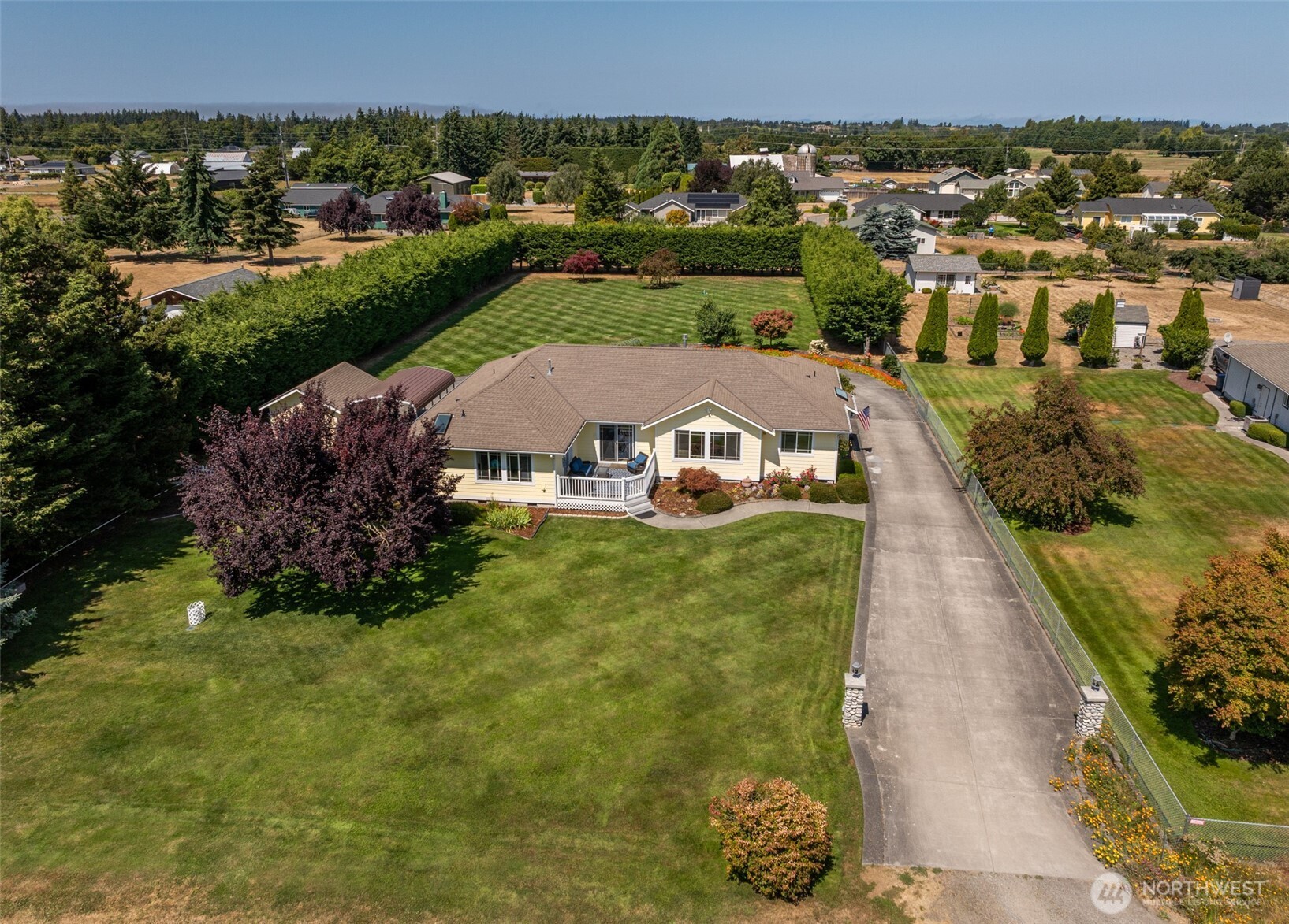 170 Donaper Road Sequim, WA 98382 - Photo 30 of 40 an aerial view of a house with a garden