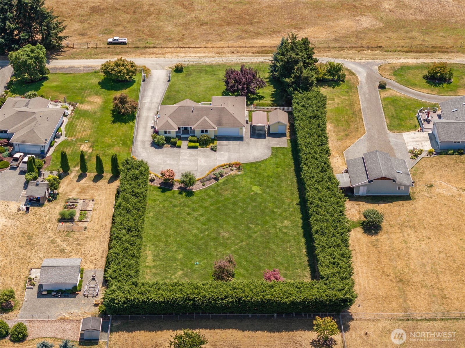 170 Donaper Road Sequim, WA 98382 - Photo 31 of 40 an aerial view of a house with a yard lake view and mountain view