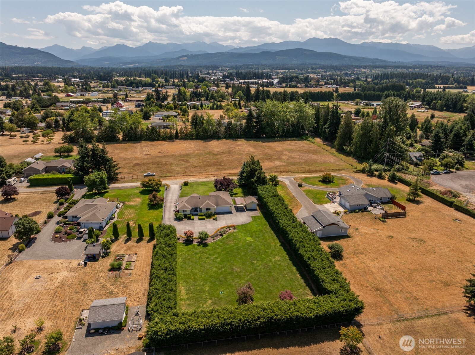 170 Donaper Road Sequim, WA 98382 - Photo 32 of 40 an aerial view of a residential houses with outdoor space