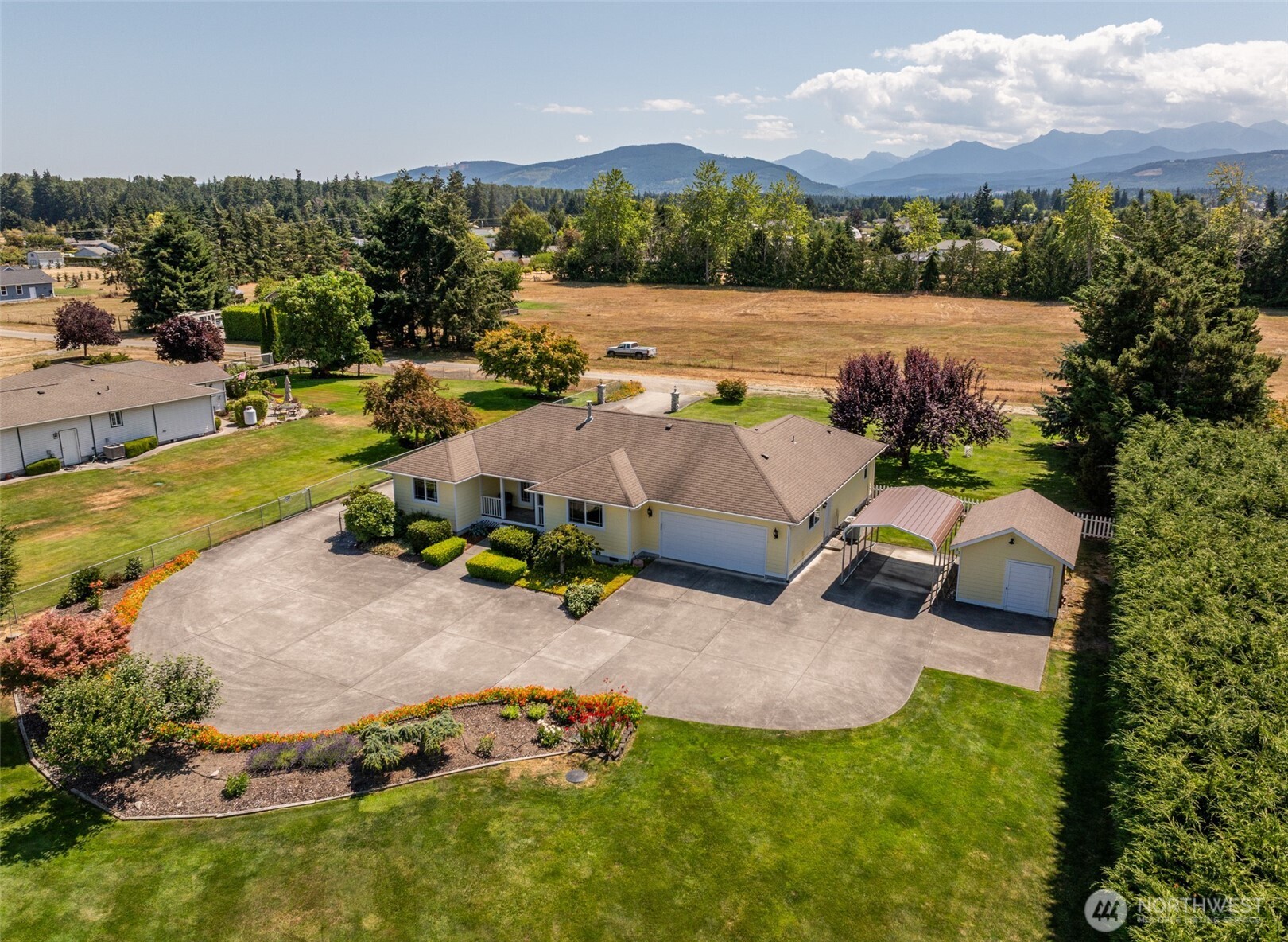 170 Donaper Road Sequim, WA 98382 - Photo 33 of 40 an aerial view of a house with garden space and street view