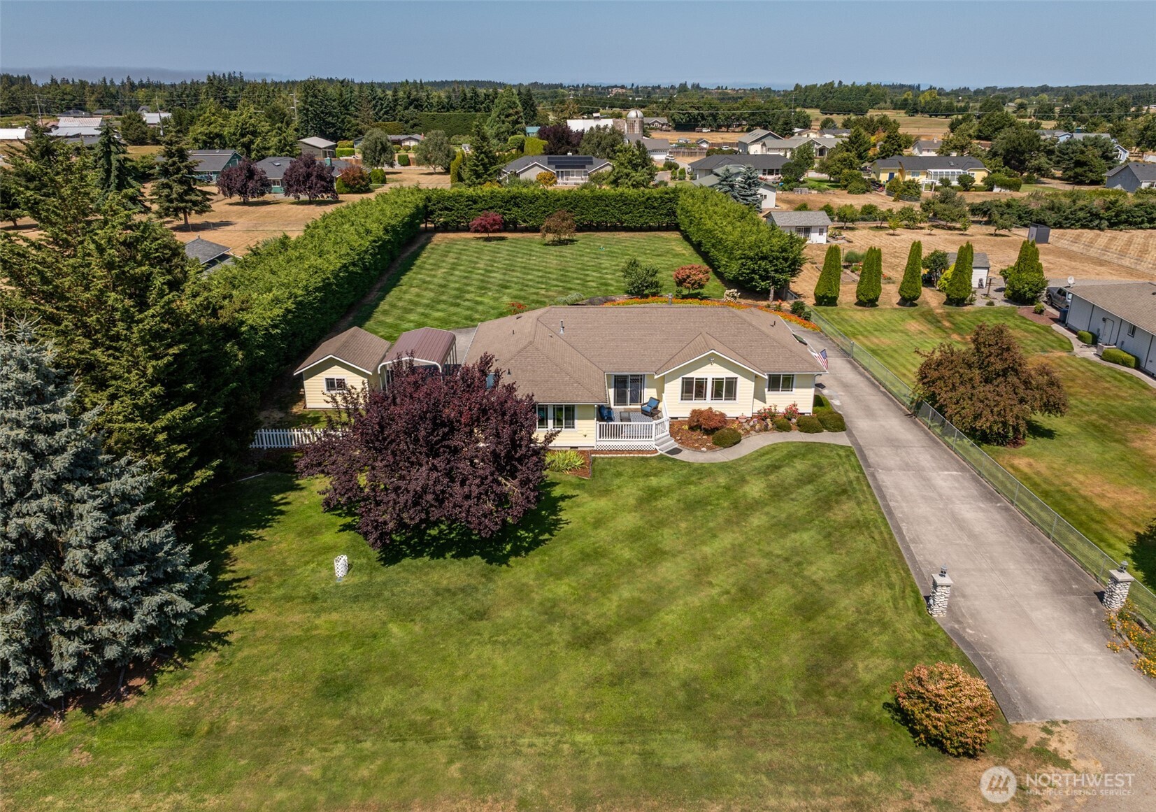 170 Donaper Road Sequim, WA 98382 - Photo 4 of 40 an aerial view of residential houses with outdoor space