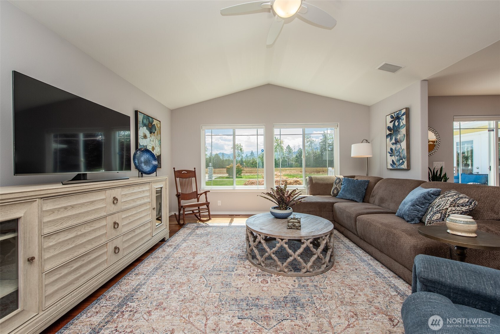 170 Donaper Road Sequim, WA 98382 - Photo 10 of 40 a living room with furniture and a flat screen tv