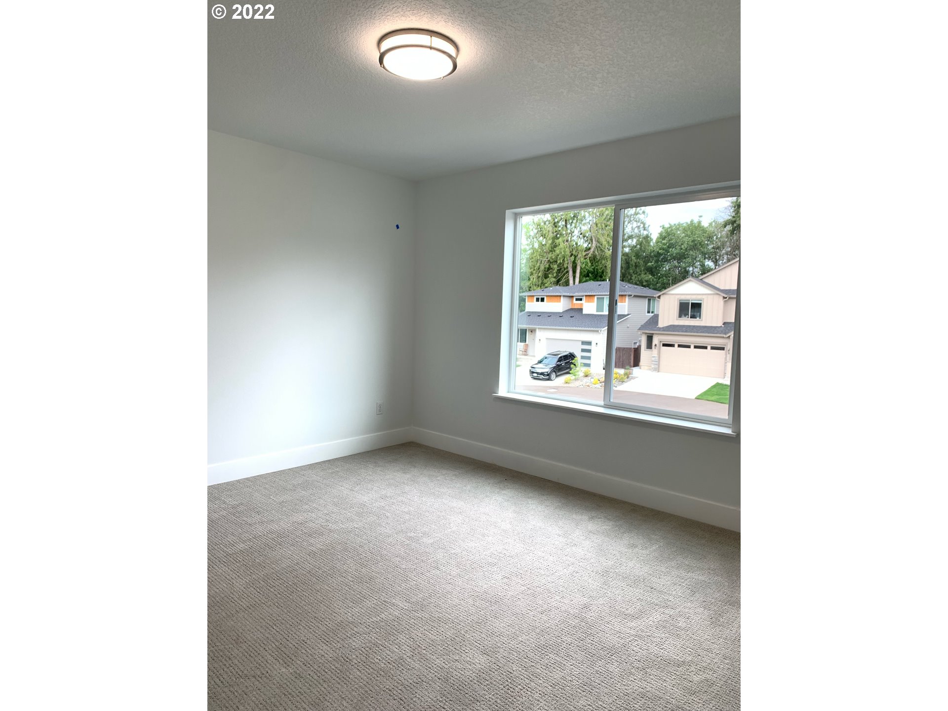 1829 North 4th Way Ridgefield, WA 98642 - Photo 11 of 17 a view of an empty room with a window