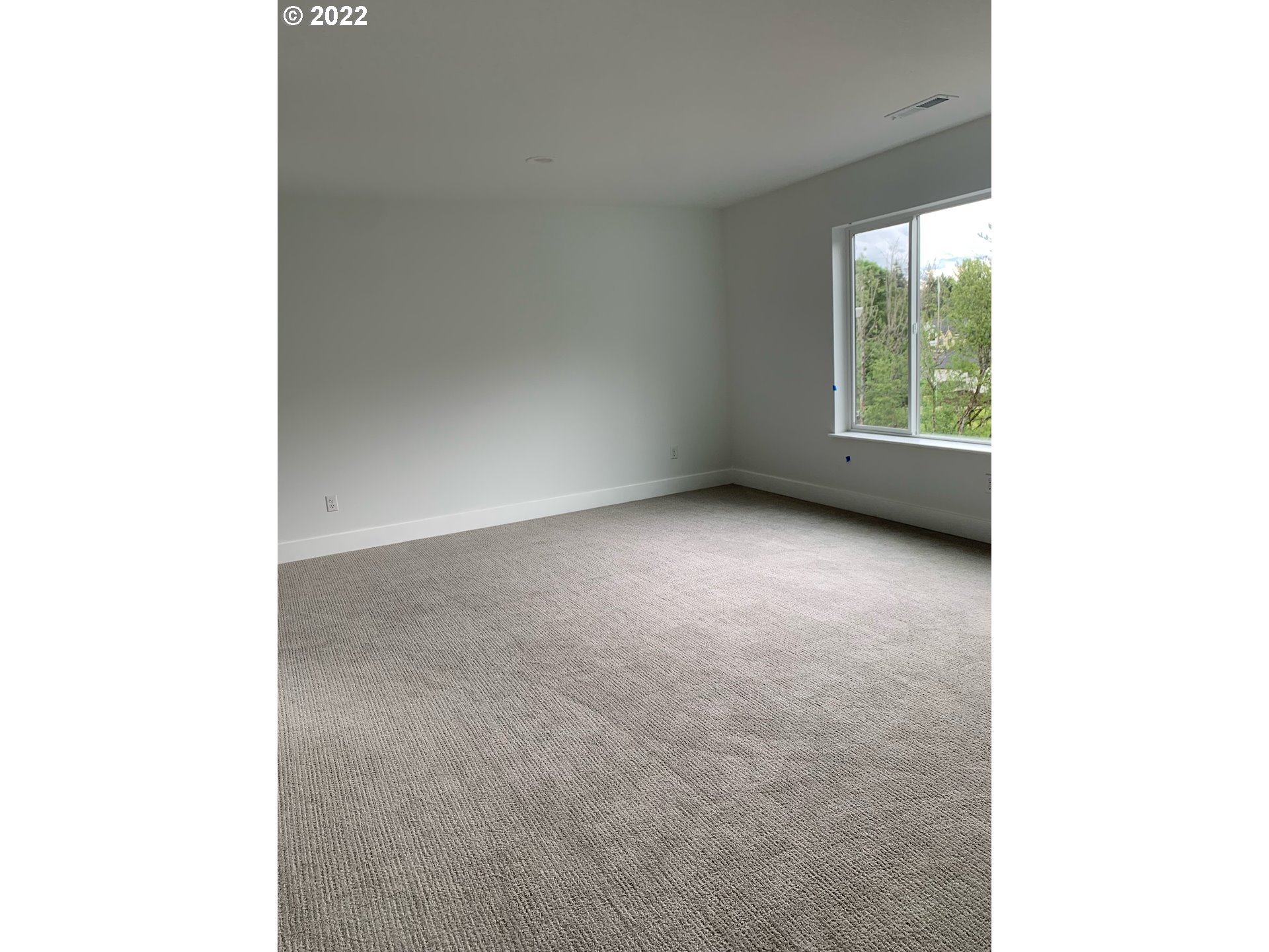 1829 North 4th Way Ridgefield, WA 98642 - Photo 13 of 17 a view of an empty room with a window
