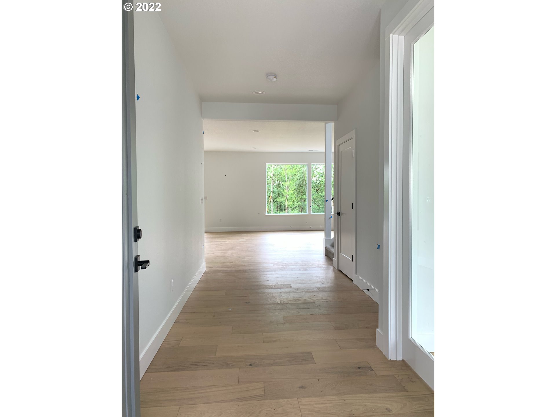 1829 North 4th Way Ridgefield, WA 98642 - Photo 2 of 17 a view of a hallway with windows