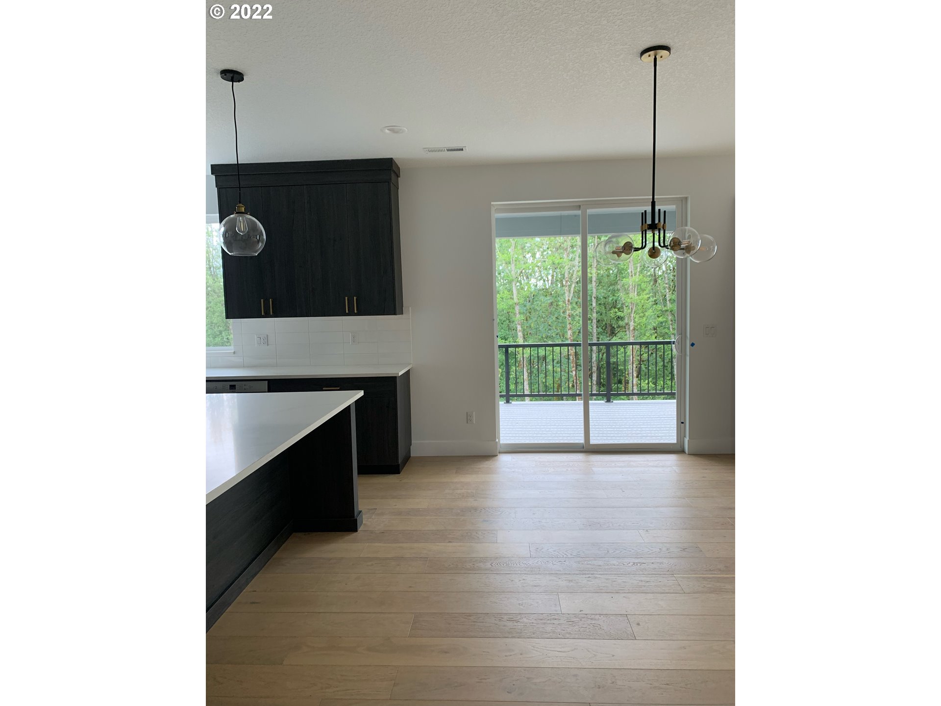 1829 North 4th Way Ridgefield, WA 98642 - Photo 5 of 17 a view of an empty room with a fireplace and a window