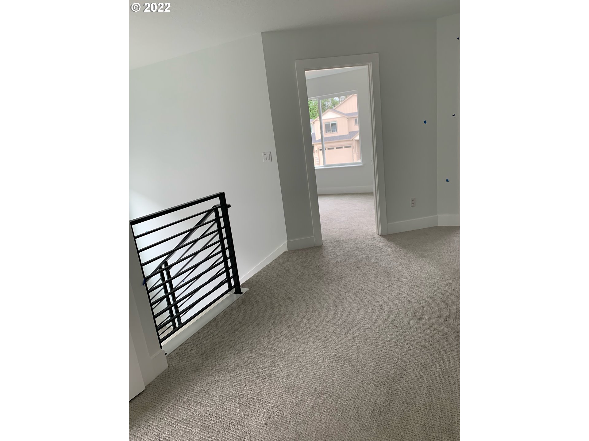 1829 North 4th Way Ridgefield, WA 98642 - Photo 7 of 17 a view of a hallway with wooden floor