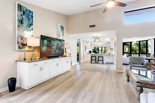 a living room with furniture and a table