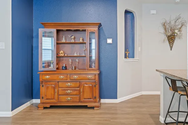 a view of front door with wooden floor