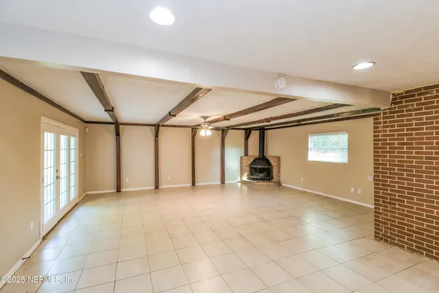 a view of a livingroom with a staircase
