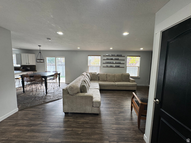 1237 South 260 West Payson, UT 84651 - Photo 30 of 81 Open concept living area with wood-finish flooring, recessed lighting, and a sliding glass door