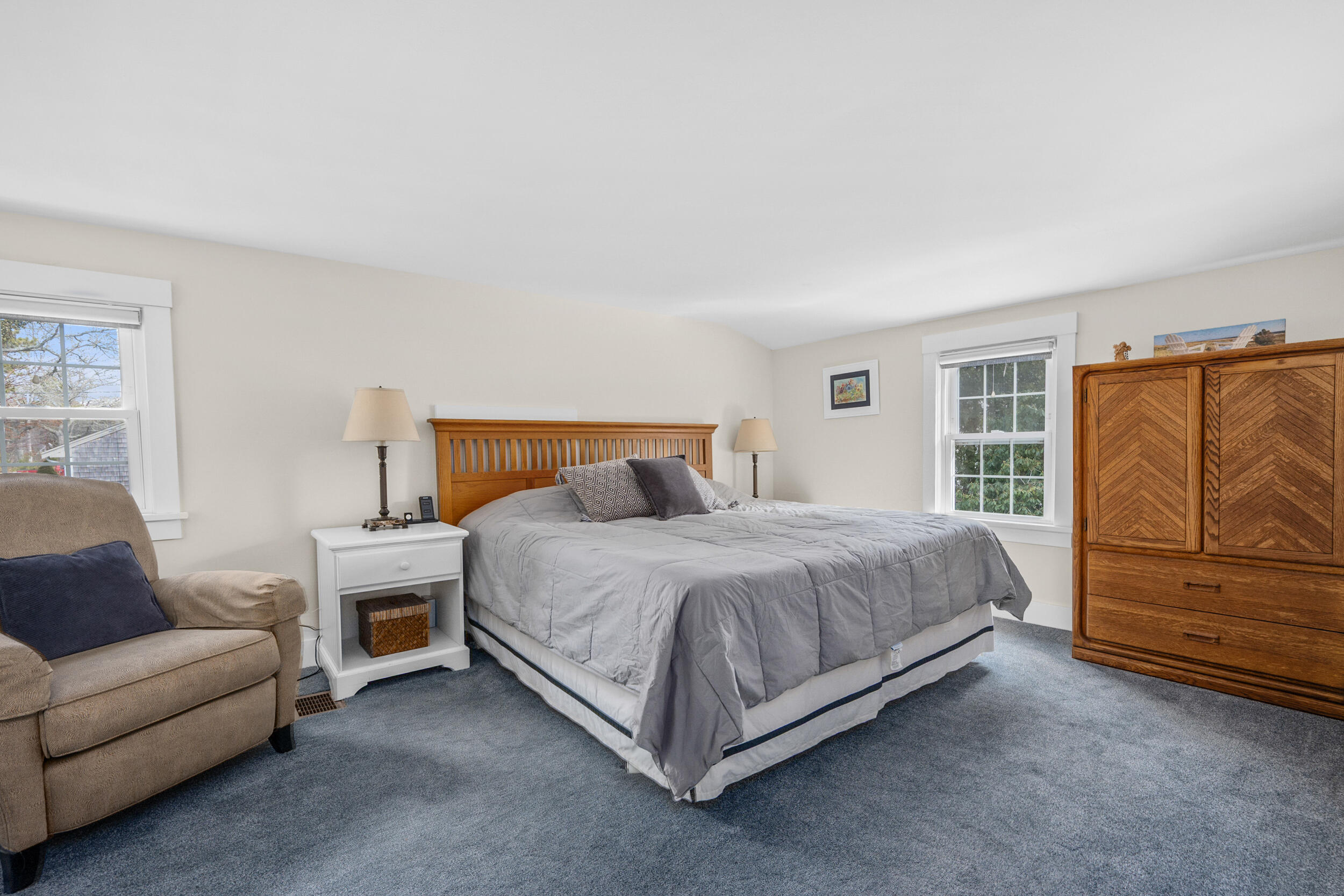 110 Fuller Road Centerville, MA 02632 - Photo 13 of 23 a spacious bedroom with a bed and with furniture