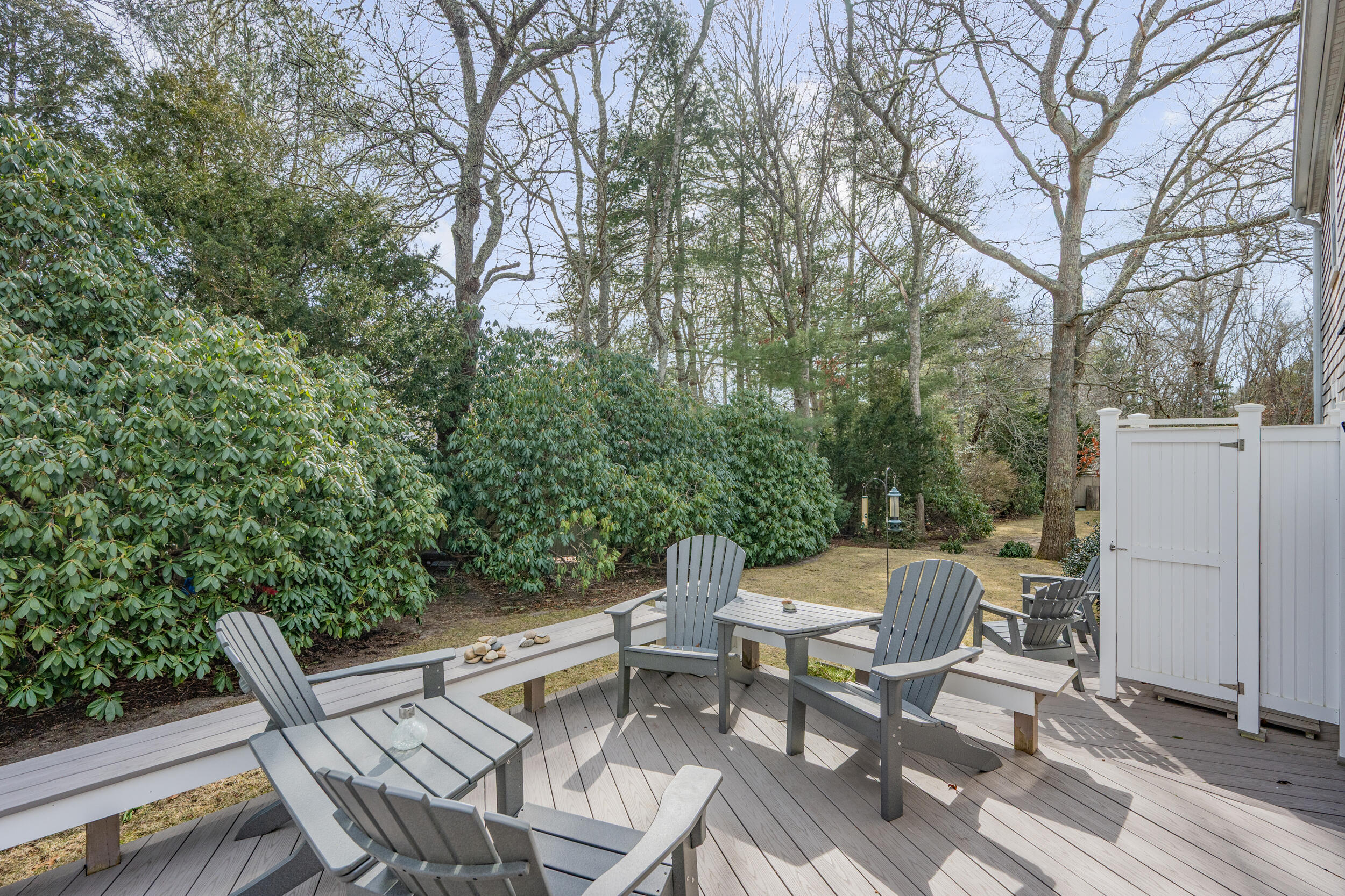 110 Fuller Road Centerville, MA 02632 - Photo 20 of 23 a view of a patio with a table and chairs and couches