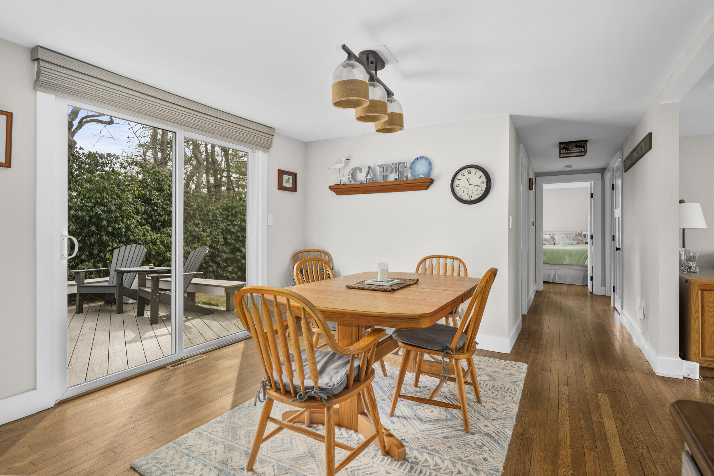 110 Fuller Road Centerville, MA 02632 - Photo 6 of 23 a view of a dining room with furniture window and wooden floor