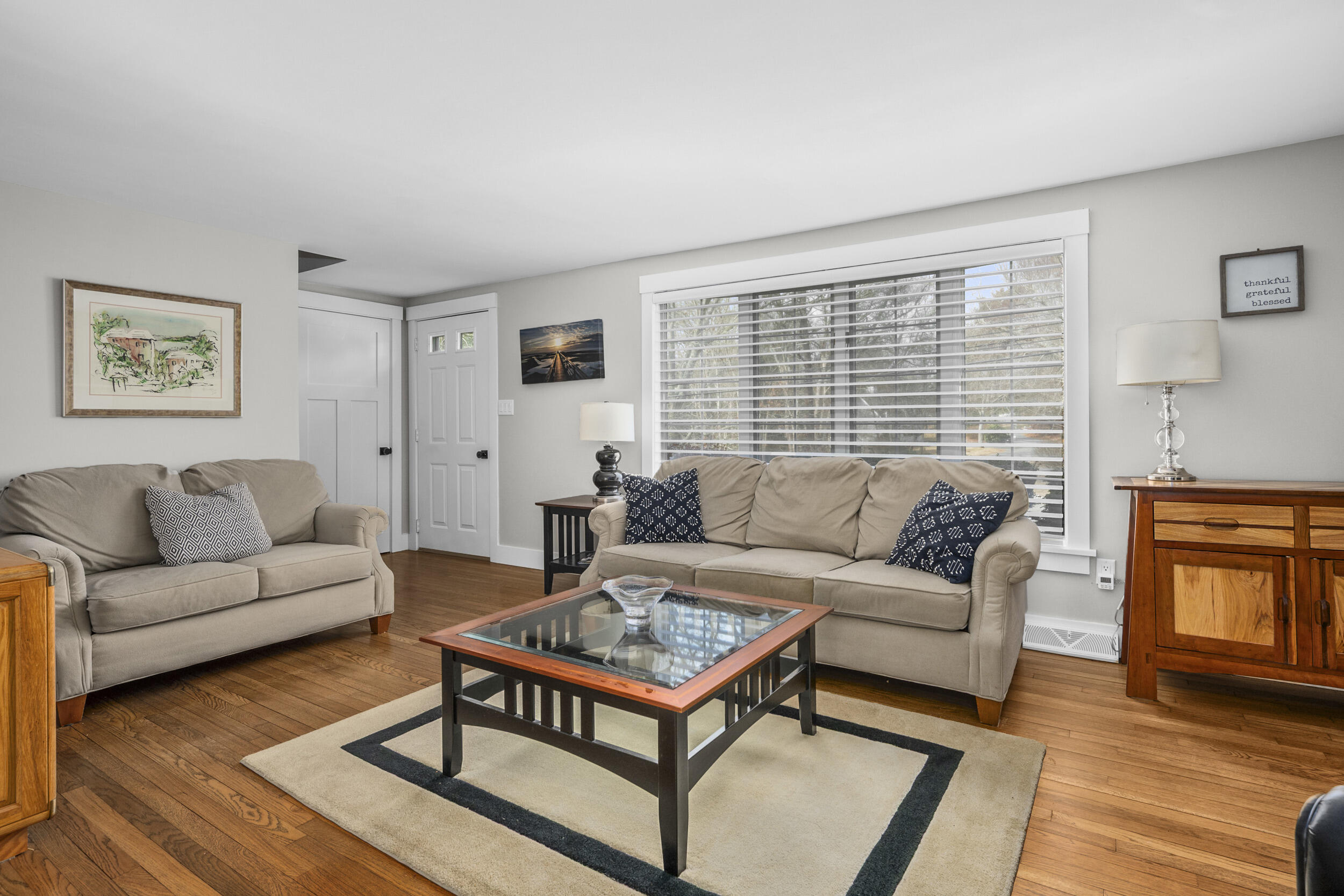110 Fuller Road Centerville, MA 02632 - Photo 7 of 23 a living room with furniture a rug and a window