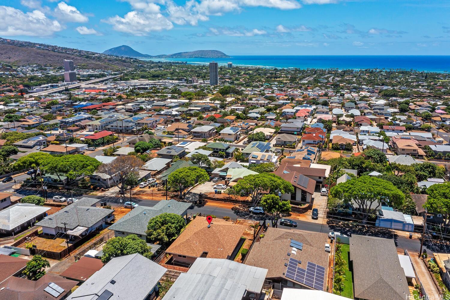 930 16th Avenue Honolulu, HI 96816 - Photo 23 of 24 an aerial view of a city with lots of residential buildings and mountain view in back