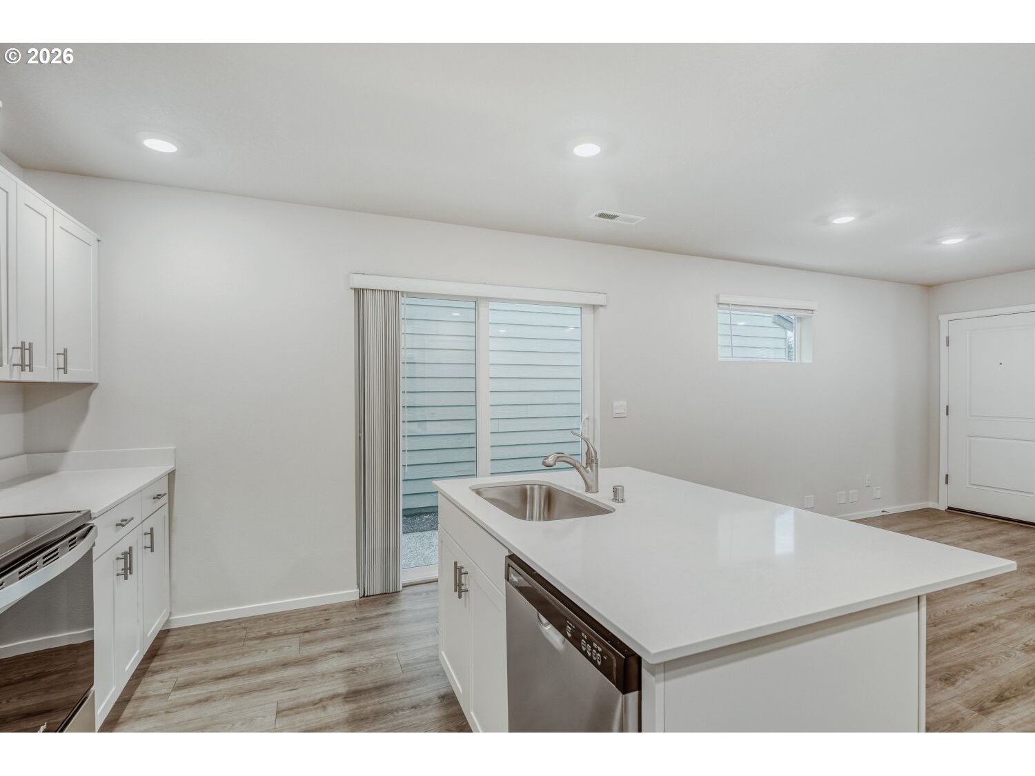 1109 Southeast 193rd Place Camas, WA 98607 - Photo 14 of 29 a kitchen with a sink cabinets and wooden floor