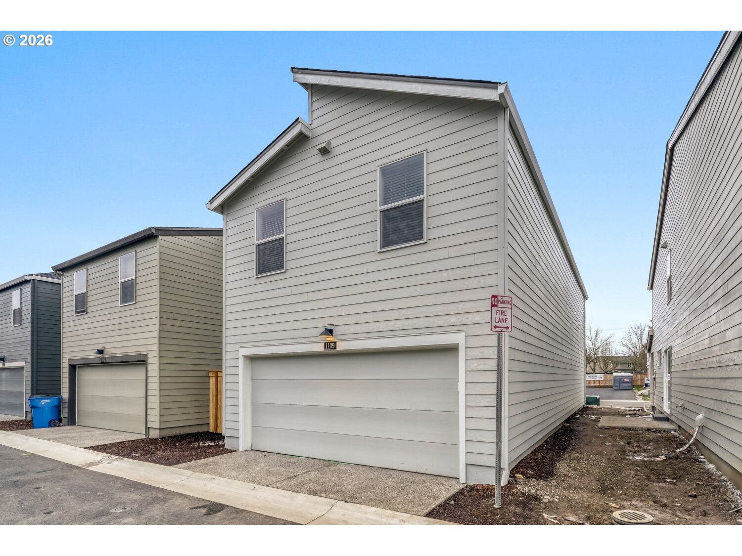 1109 Southeast 193rd Place Camas, WA 98607 - Photo 27 of 29 a view of a small house with wooden fence