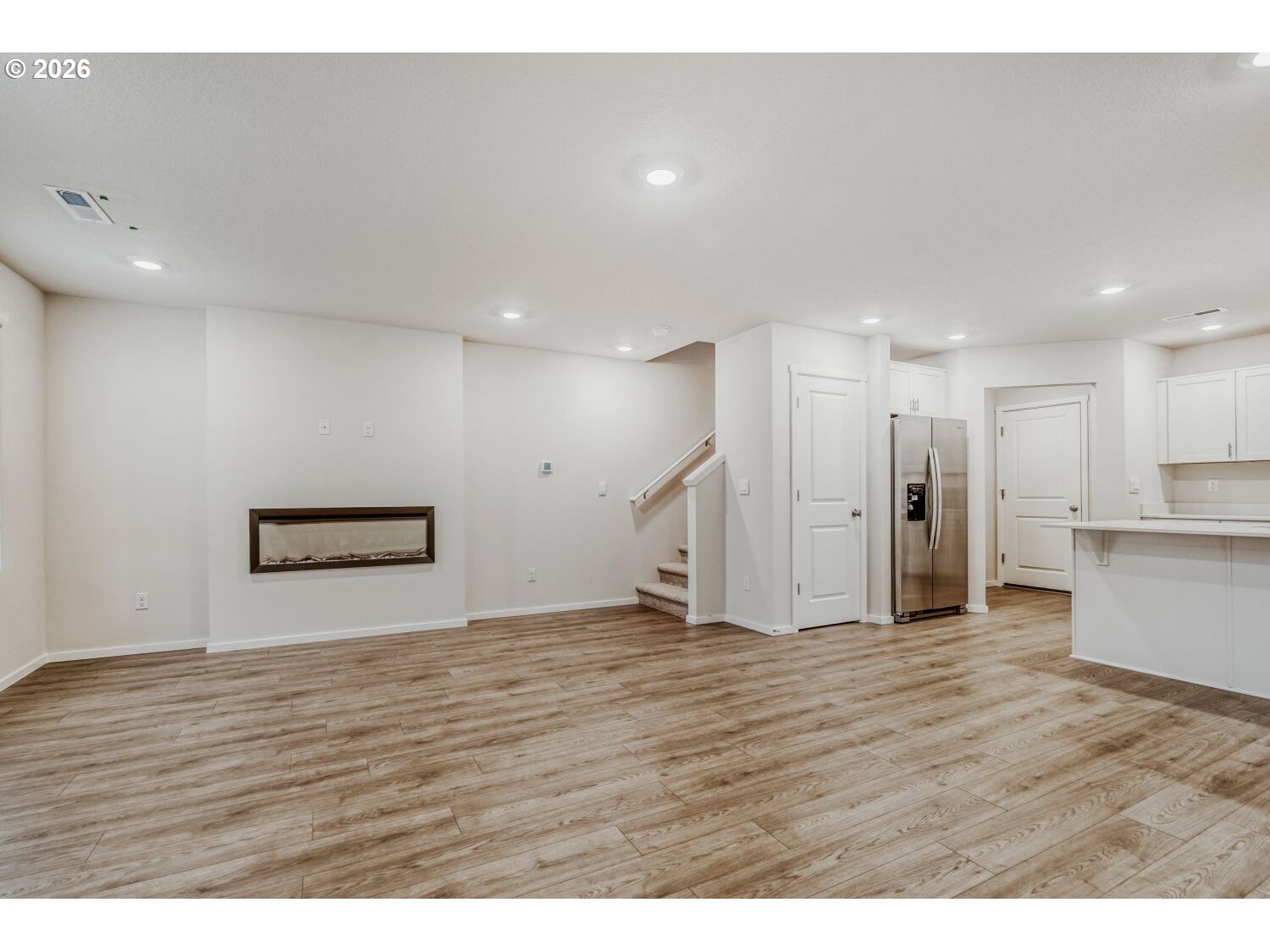 1109 Southeast 193rd Place Camas, WA 98607 - Photo 7 of 29 a view of an empty room with wooden floor