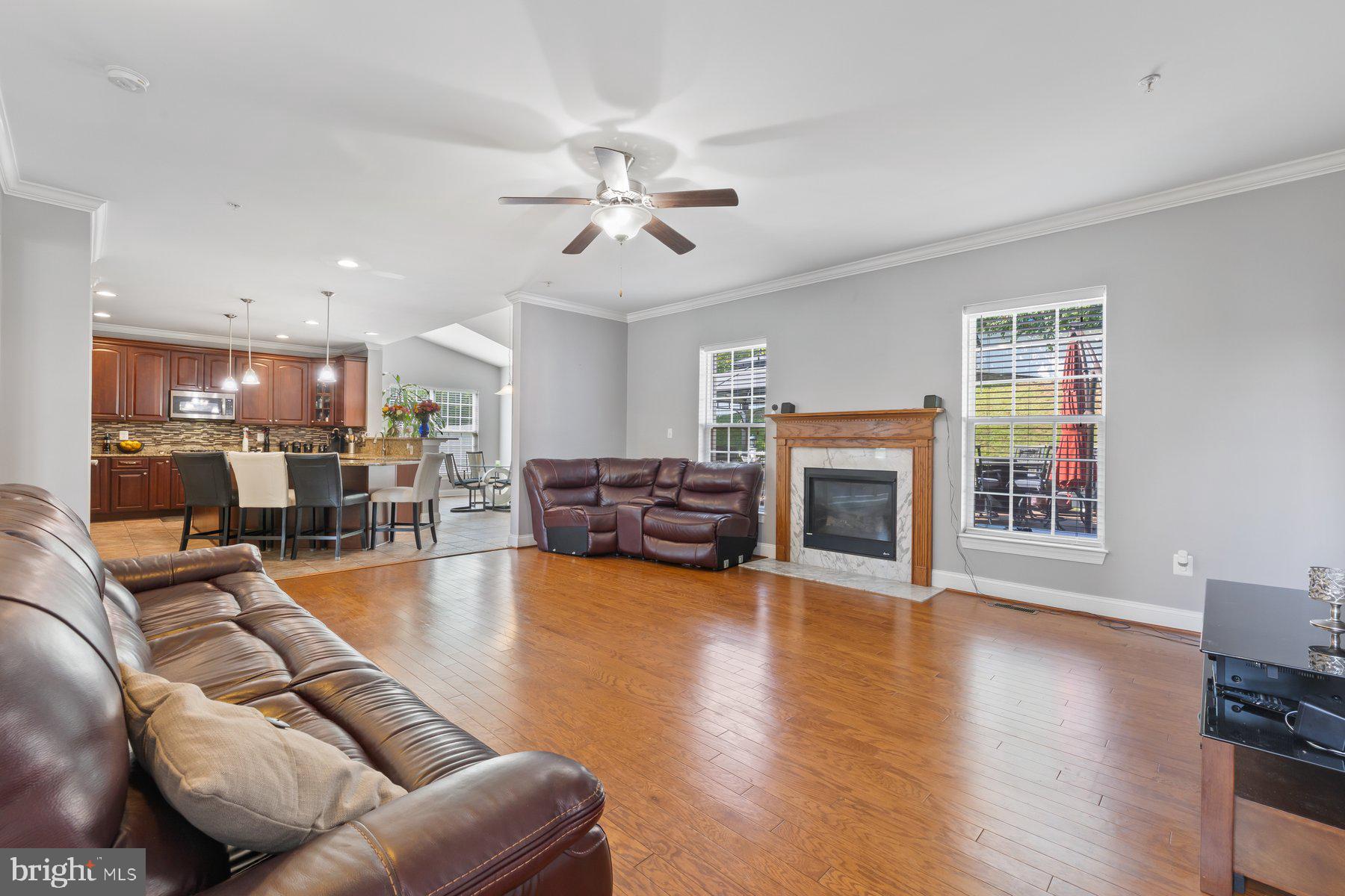 6 Cedar Grove Court Baltimore, MD 21237 - Photo 17 of 50 a living room with fireplace furniture and a wooden floor