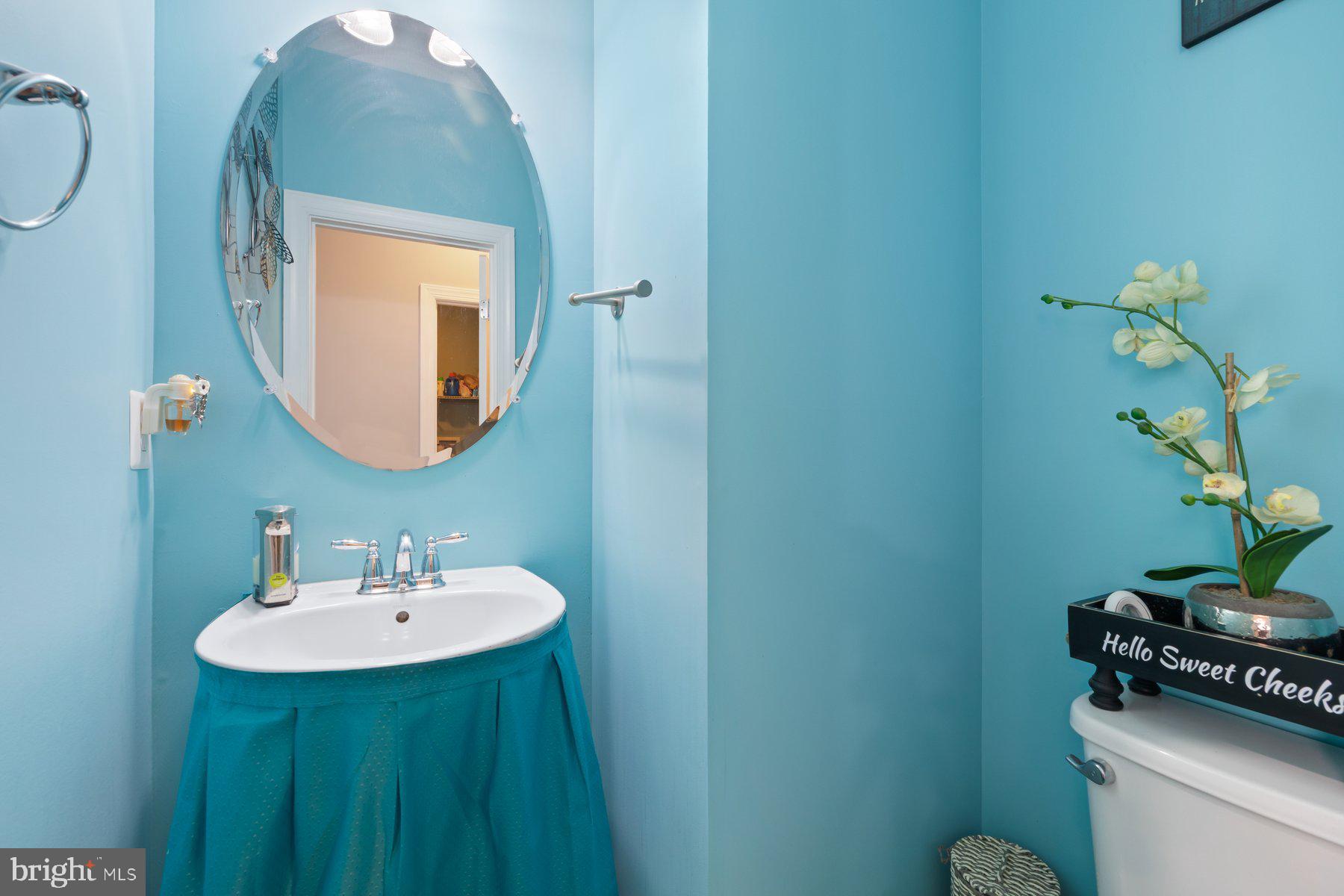 6 Cedar Grove Court Baltimore, MD 21237 - Photo 20 of 50 a bathroom with a sink and a mirror
