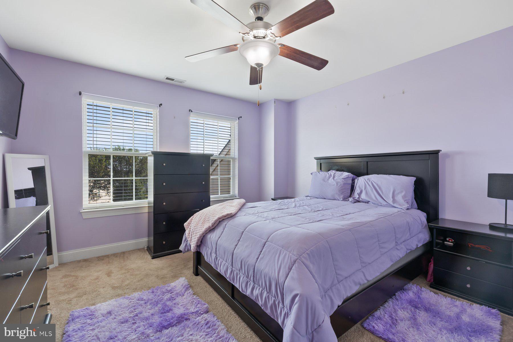 6 Cedar Grove Court Baltimore, MD 21237 - Photo 27 of 50 a bedroom with a bed and a window