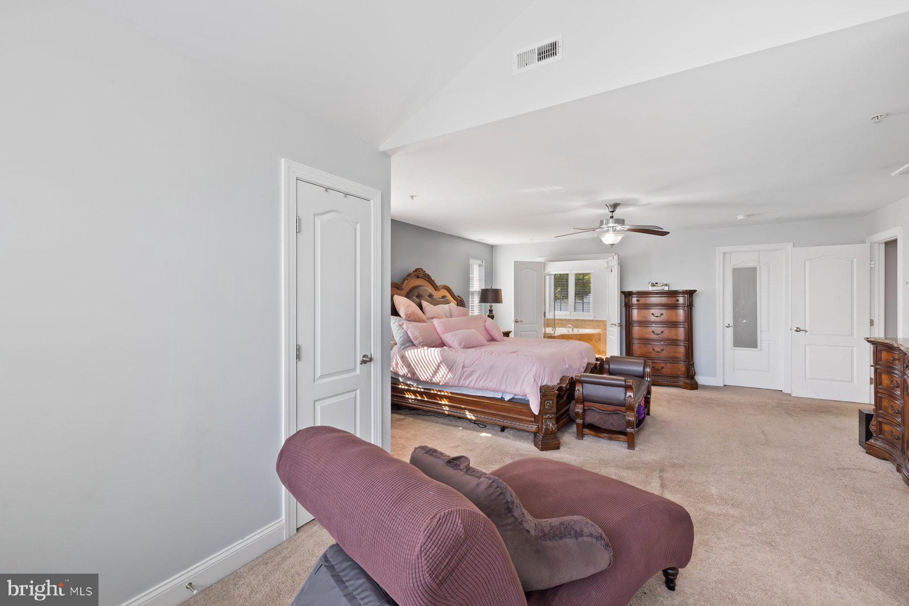 6 Cedar Grove Court Baltimore, MD 21237 - Photo 35 of 50 a bedroom with furniture and a couch