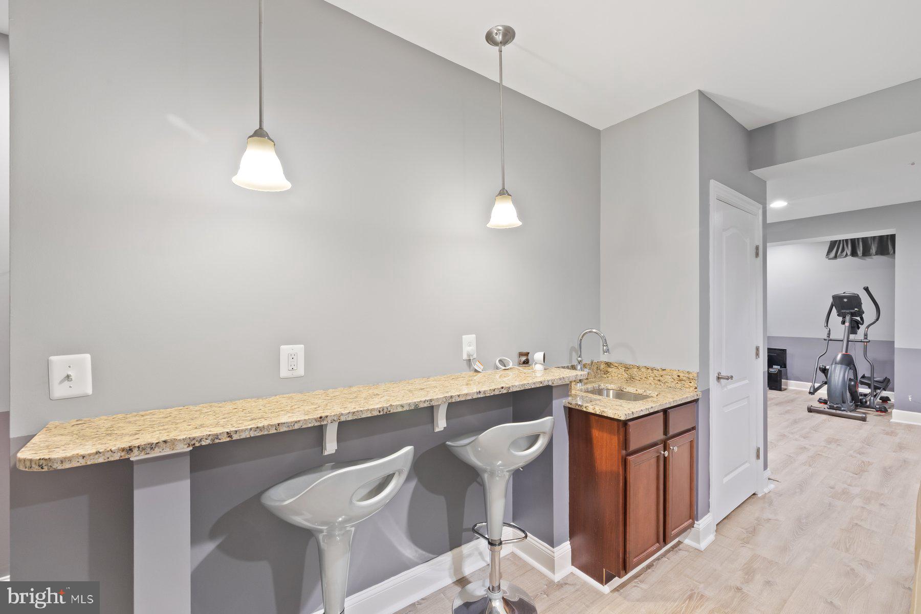 6 Cedar Grove Court Baltimore, MD 21237 - Photo 40 of 50 a bathroom with a sink a light fixture and a mirror